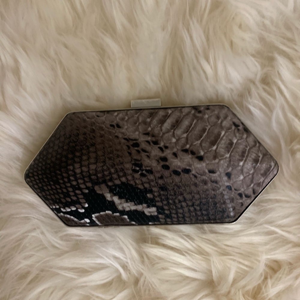 small snakeskin clutch bag